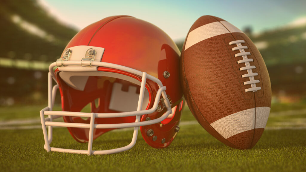 Bola de futebol americano e capacete na grama da arena de futebol ou estádio. Ilustração 3D